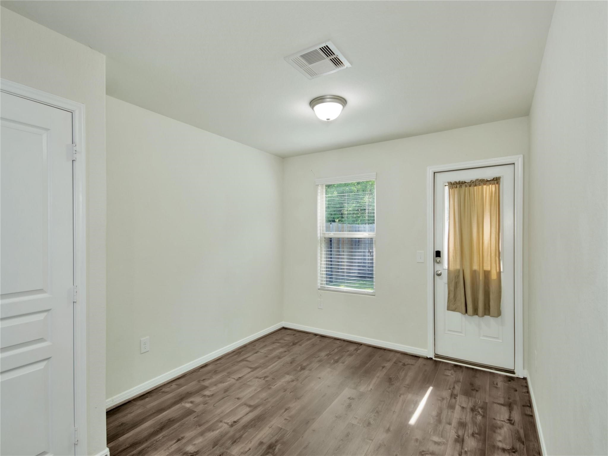 9906 Orchid Spring Lane Houston, TX 77044 - Photo 15 of 27 a view of an empty room and window