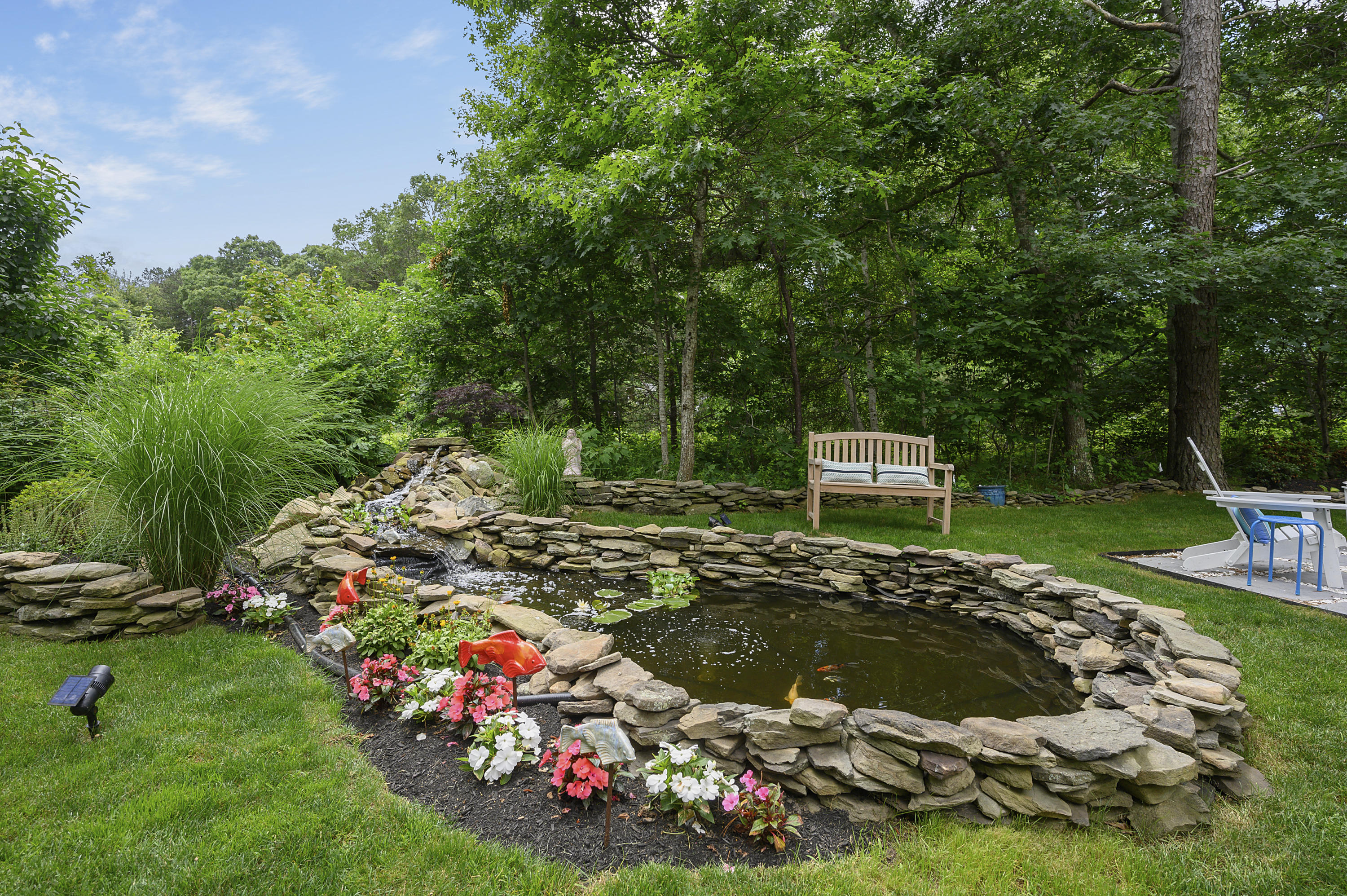 9 Bunker Circle Sandwich, MA 02563 - Photo 29 of 39 028-photo-rear-view-8419186