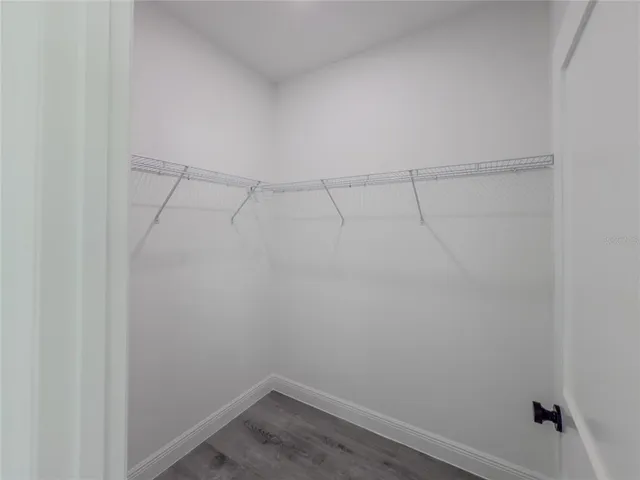 a view of a room with racks on the wall