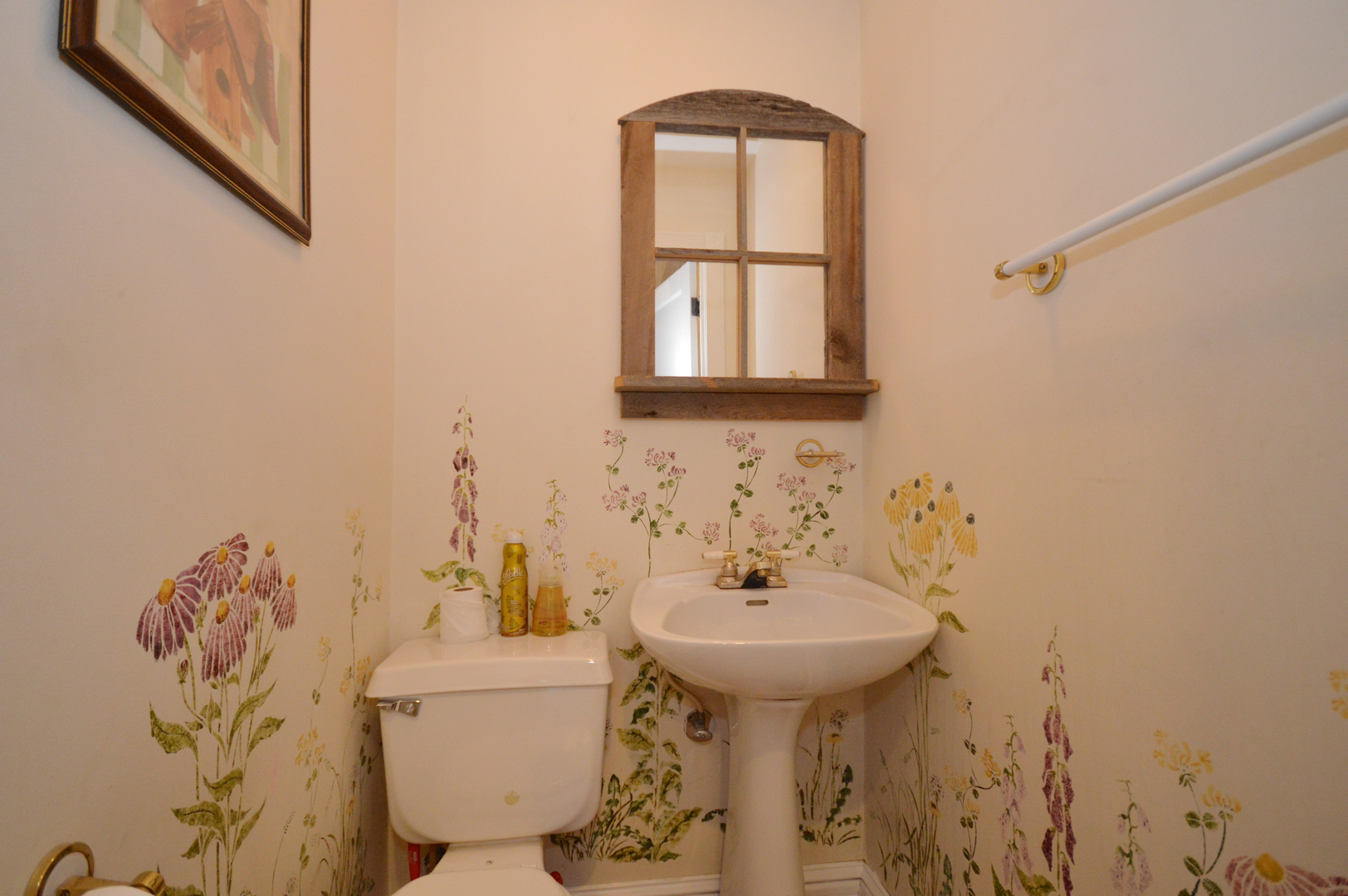 1038 Ferndale Street Gurnee, IL 60031 - Photo 10 of 17 a bathroom with a sink toilet and mirror