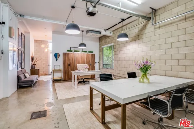 a workspace with chandelier