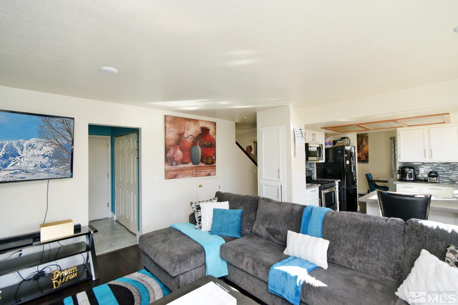 902 Vine Street Reno, NV 89503 - Photo 12 of 20 a living room with furniture and wooden floor