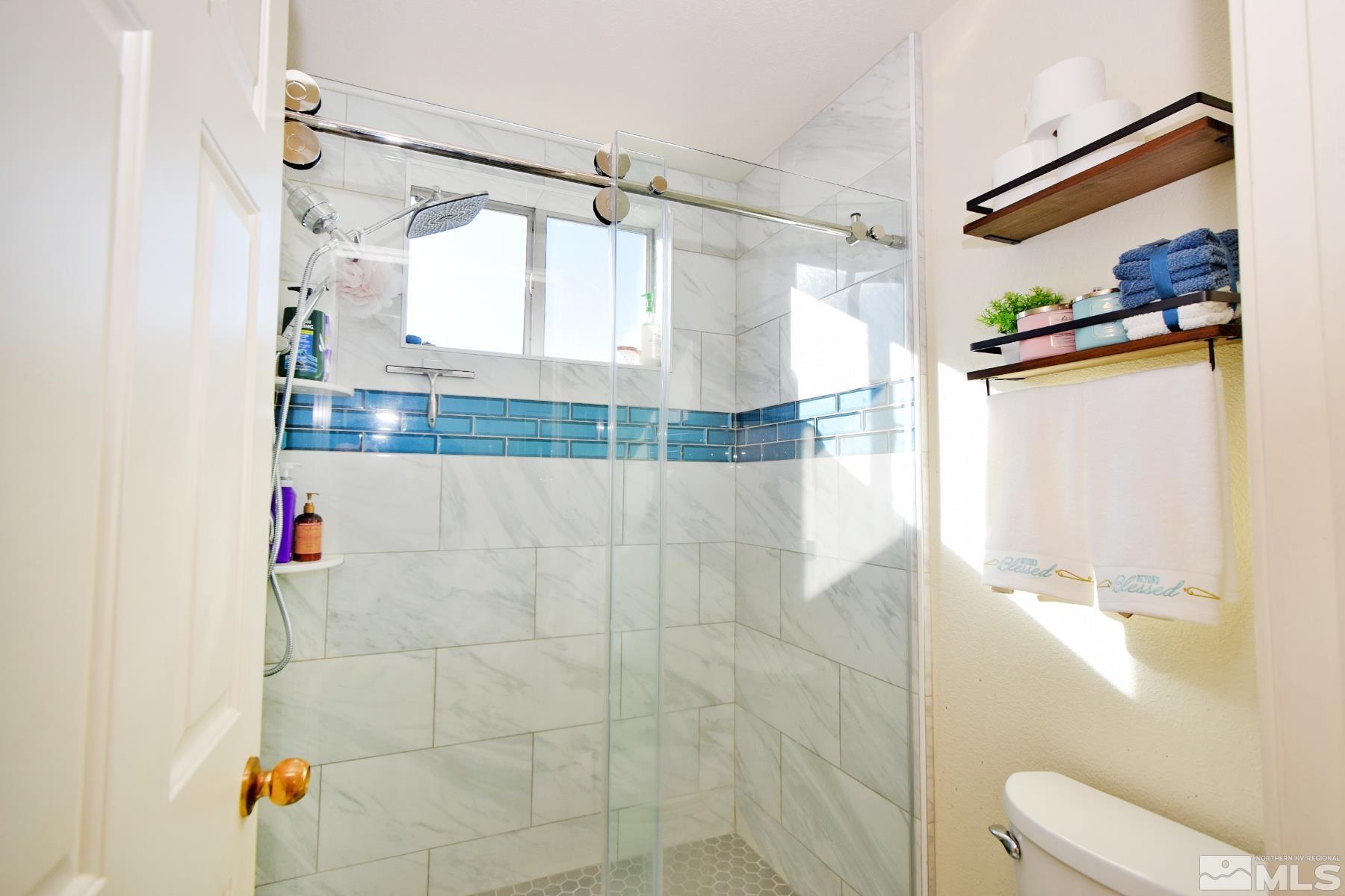 902 Vine Street Reno, NV 89503 - Photo 16 of 20 a bathroom with a shower and a toilet