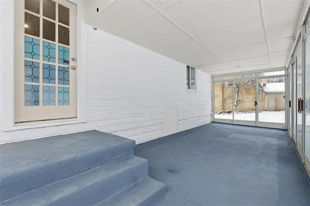 an empty room with windows