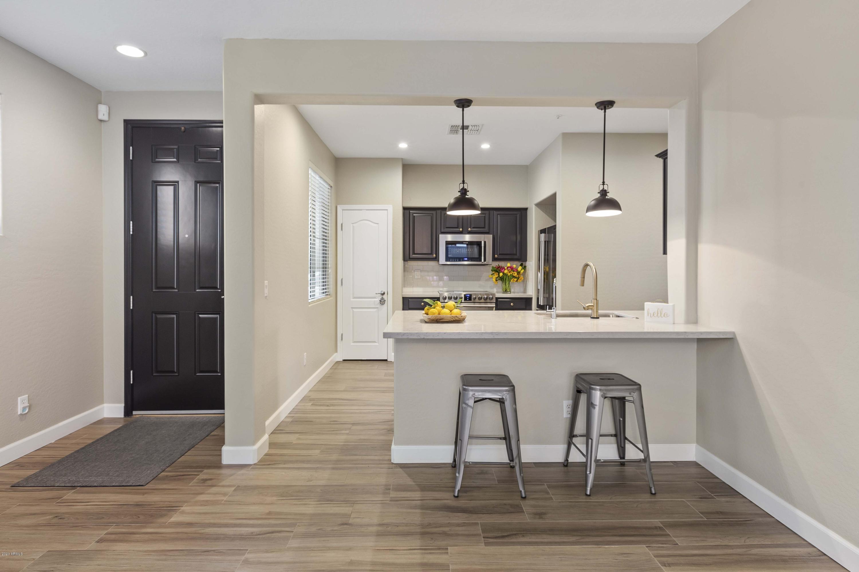 3854 East Flower Street Gilbert, AZ 85298 - Photo 5 of 20 Front entry/kitchen