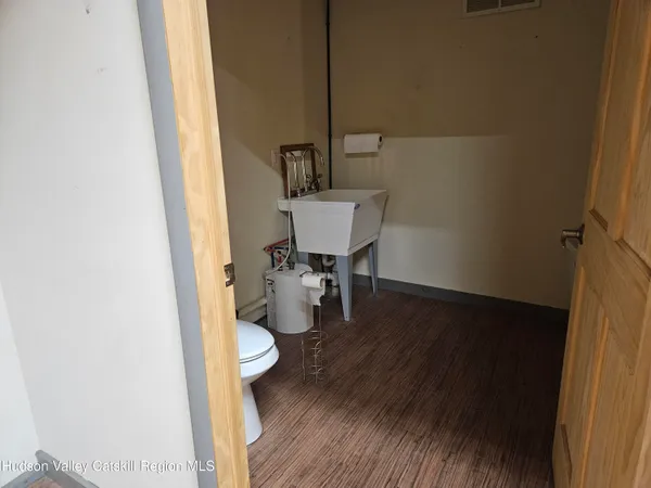 a bathroom with a sink and a toilet