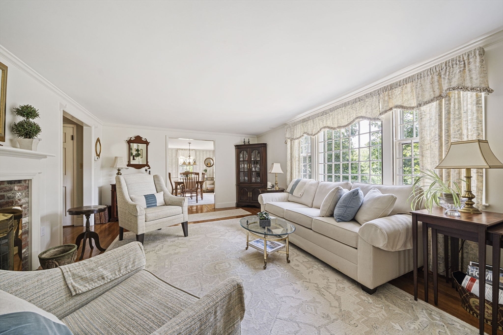 639 Main Street Hingham, MA 02043 - Photo 11 of 41 a living room with furniture and a large window