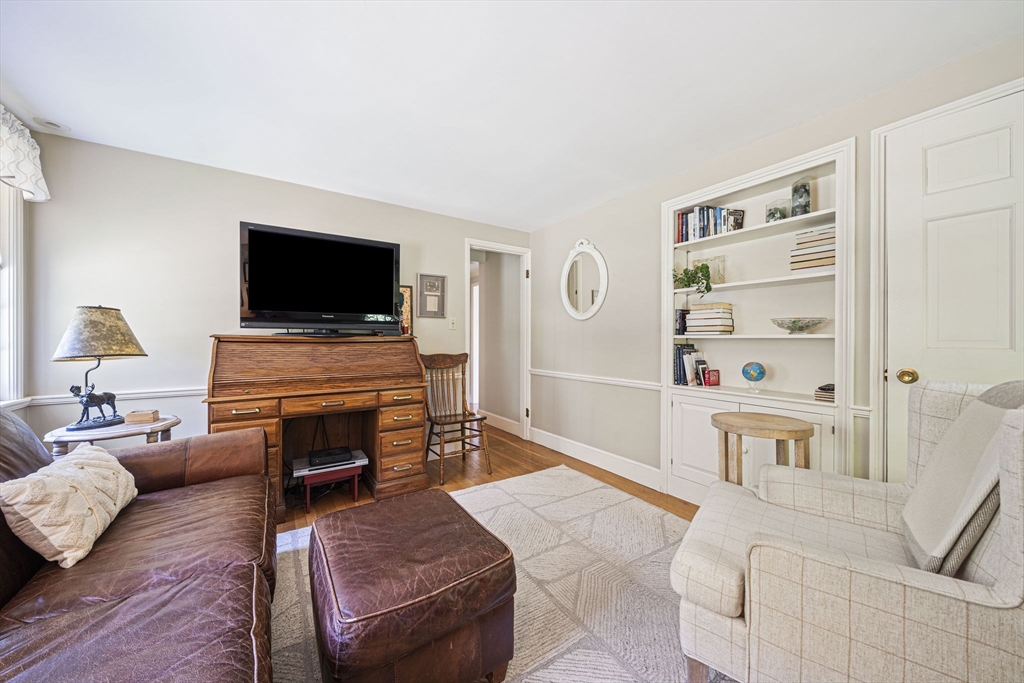 639 Main Street Hingham, MA 02043 - Photo 14 of 41 a living room with furniture and a flat screen tv