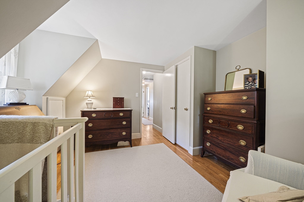639 Main Street Hingham, MA 02043 - Photo 16 of 41 a living room with a dresser and a mirror