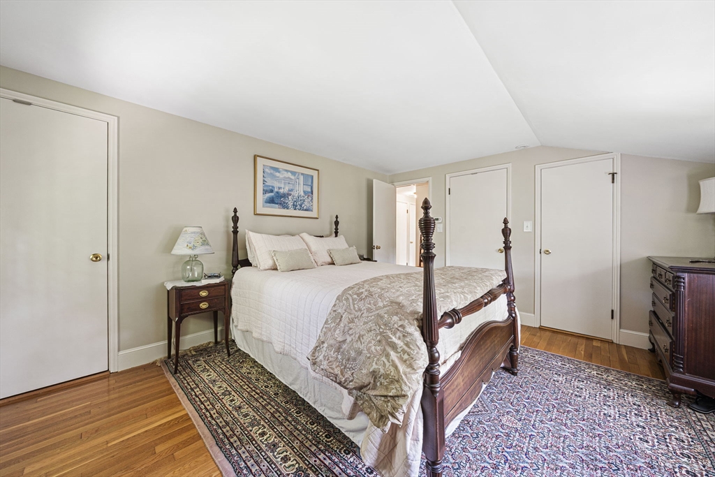 639 Main Street Hingham, MA 02043 - Photo 17 of 41 a bedroom with a bed rug and a window