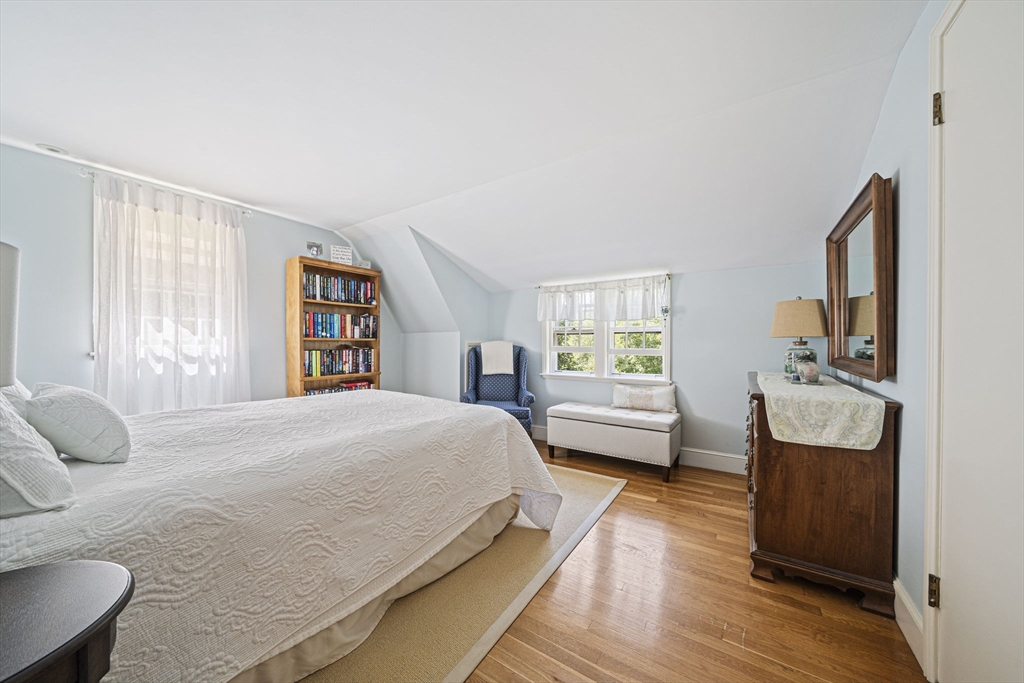 639 Main Street Hingham, MA 02043 - Photo 19 of 41 a bedroom with a bed and wooden floor