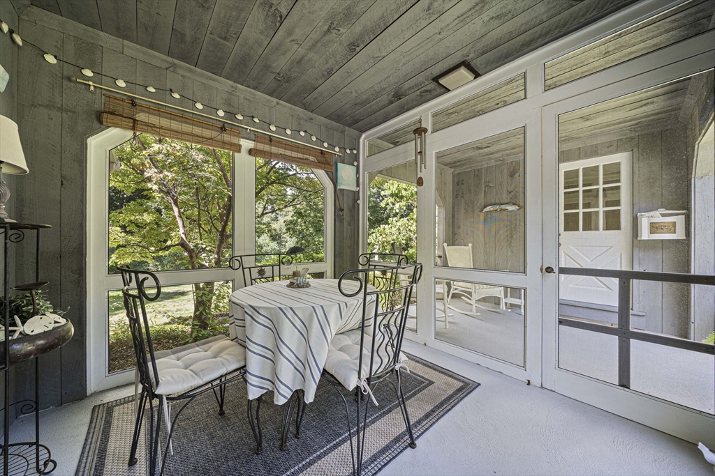 639 Main Street Hingham, MA 02043 - Photo 31 of 41 a view of a dining room with furniture window and outside view