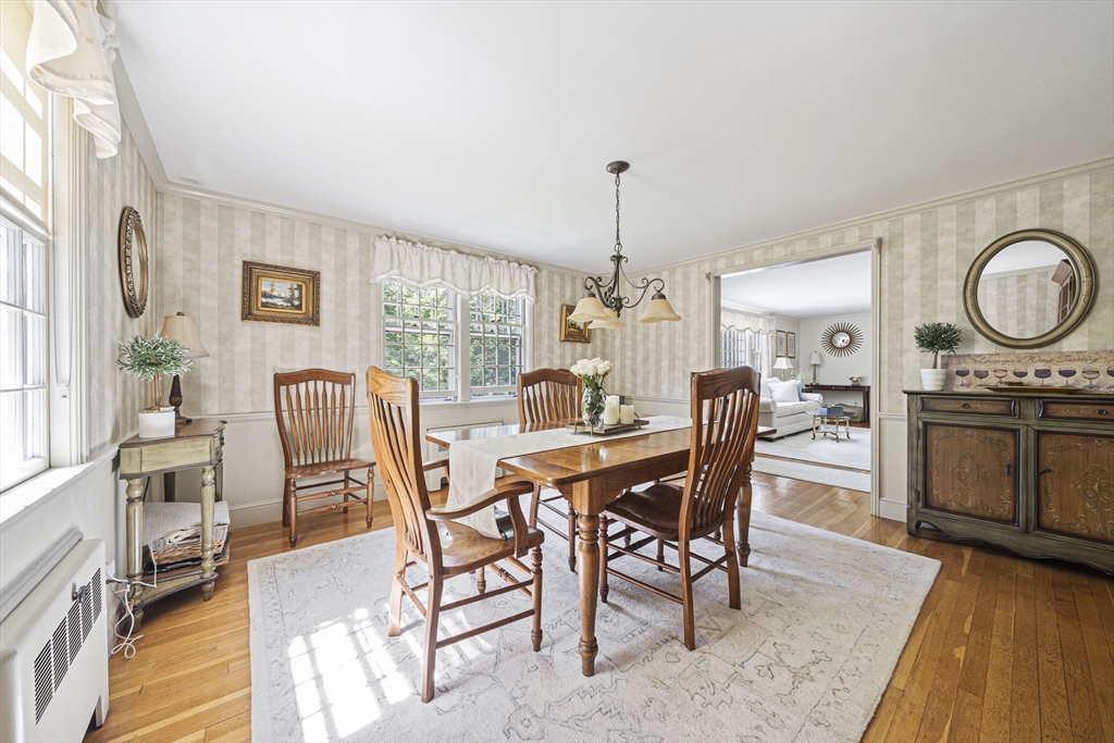 639 Main Street Hingham, MA 02043 - Photo 9 of 41 a view of a dining room with furniture window and wooden floor
