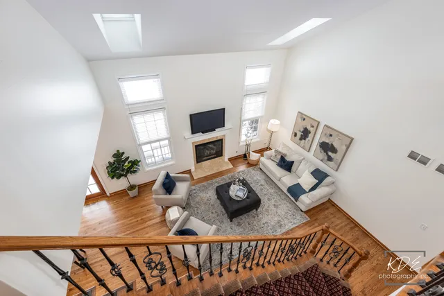 a bed room with a bed and a chandelier