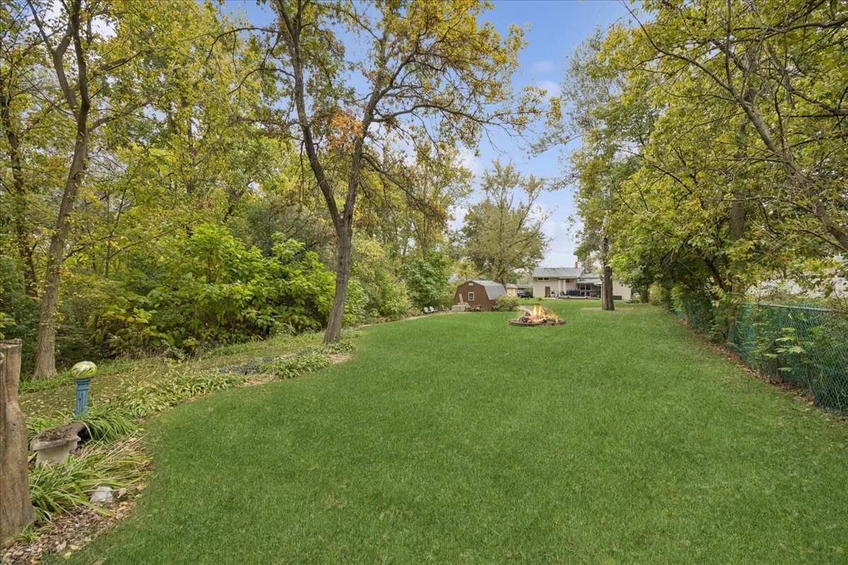 305 Poplar Lane New Lenox, IL 60451 - Photo 19 of 23 a green field with lots of trees in it
