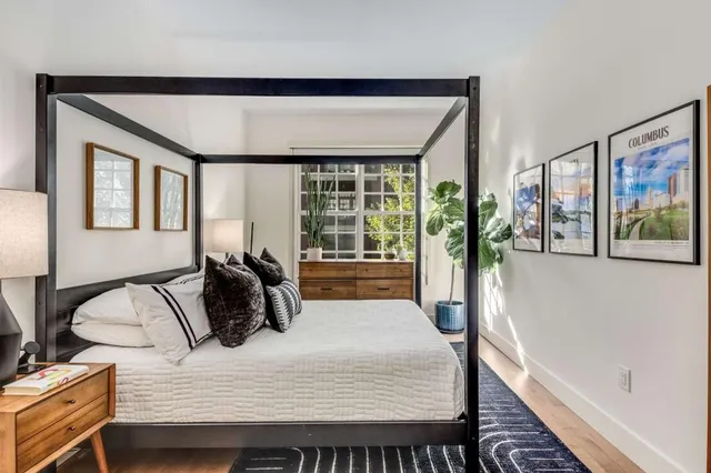 a kitchen with stainless steel appliances granite countertop a stove and a refrigerator