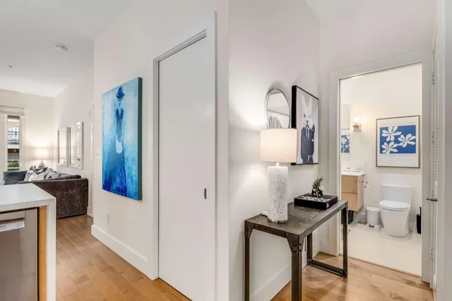 a kitchen with granite countertop stainless steel appliances and cabinets
