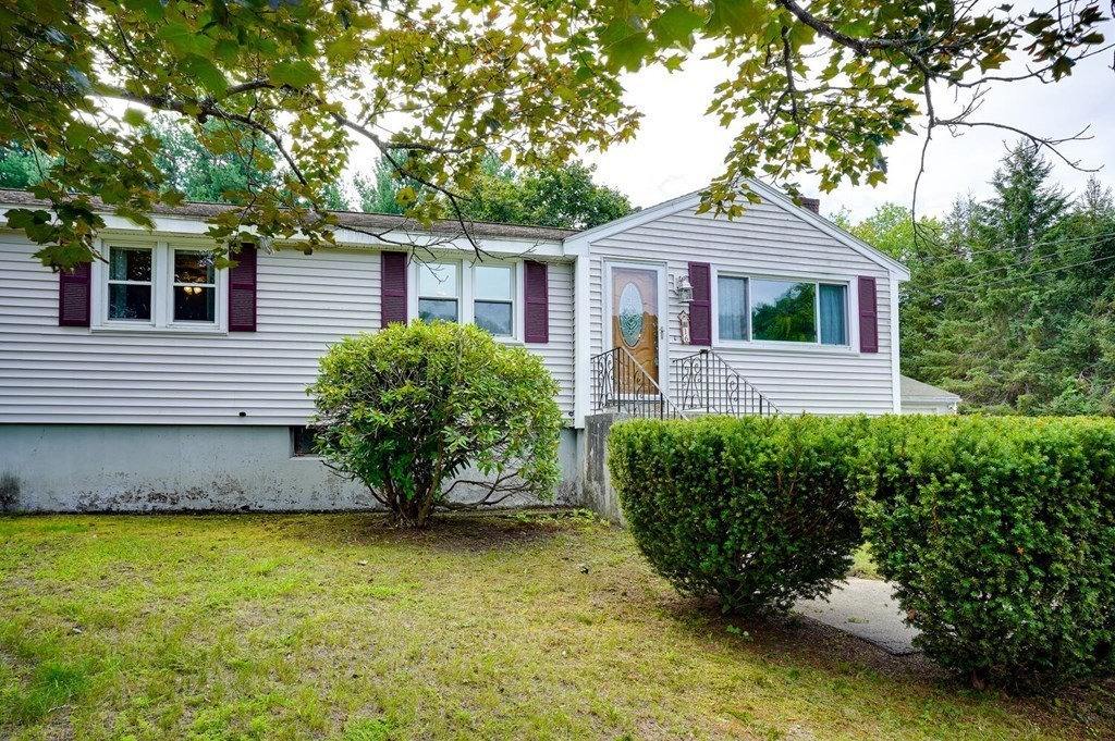 16 Lasallette Road, Unit 16 Billerica, MA 01821 - Photo 1 of 27 a front view of a house with garden