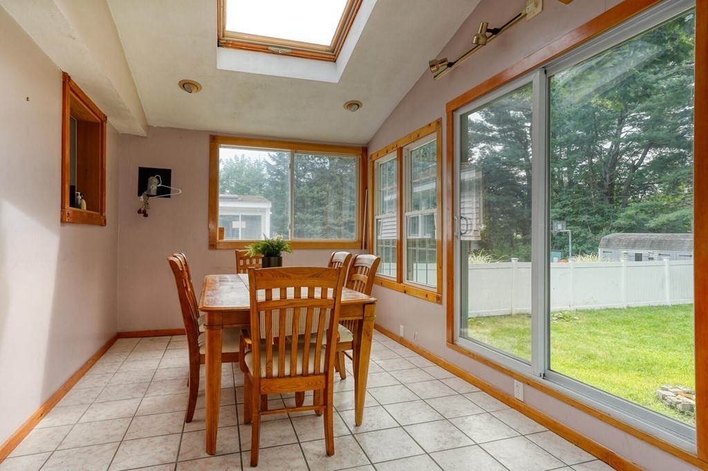 16 Lasallette Road, Unit 16 Billerica, MA 01821 - Photo 11 of 27 a view of a dining room with furniture and window