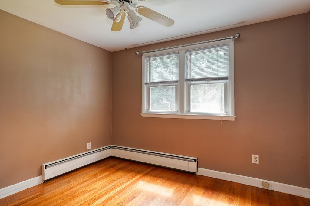 16 Lasallette Road, Unit 16 Billerica, MA 01821 - Photo 14 of 27 a view of a room with a window and a ceiling fan