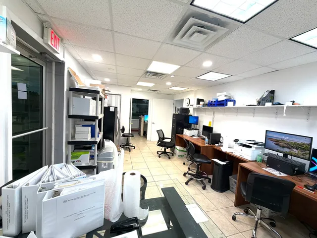 a living room with couch and a flat screen tv
