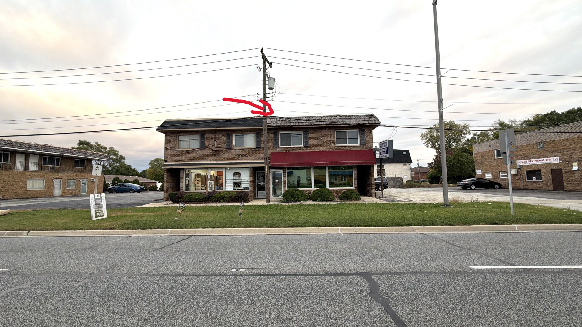 9243 South Roberts Road Hickory Hills, IL 60457 - Photo 3 of 26 a view of a house next to a yard