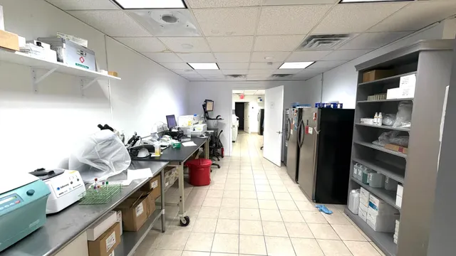 a room with lots of furniture and gym equipment