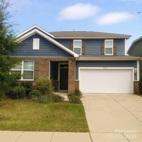 a front view of house with yard