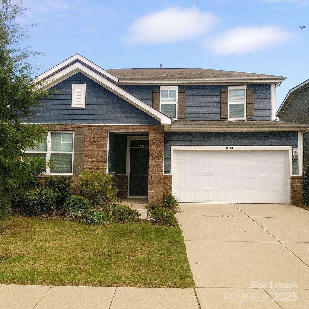 a front view of house with yard