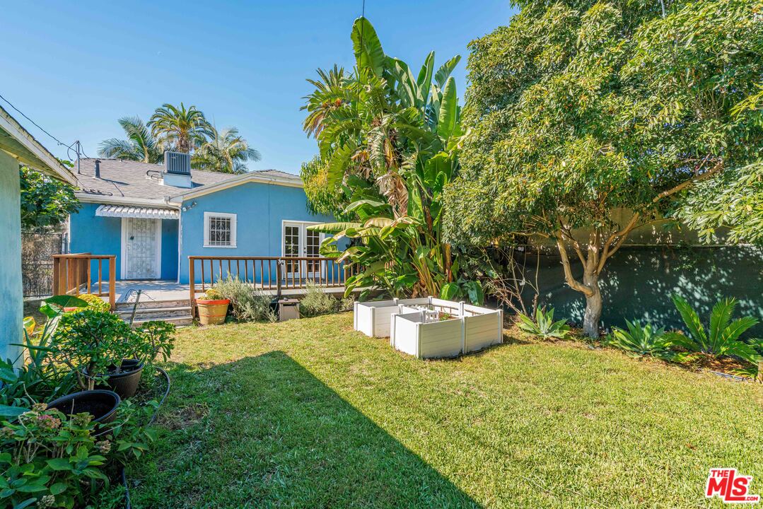 2832 Virginia Road Los Angeles, CA 90016 - Photo 14 of 14 a view of a house with backyard and sitting area