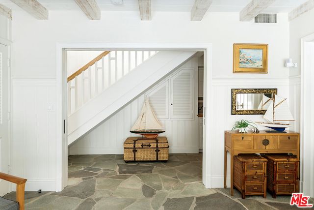a bathroom with a sink double vanity and shower