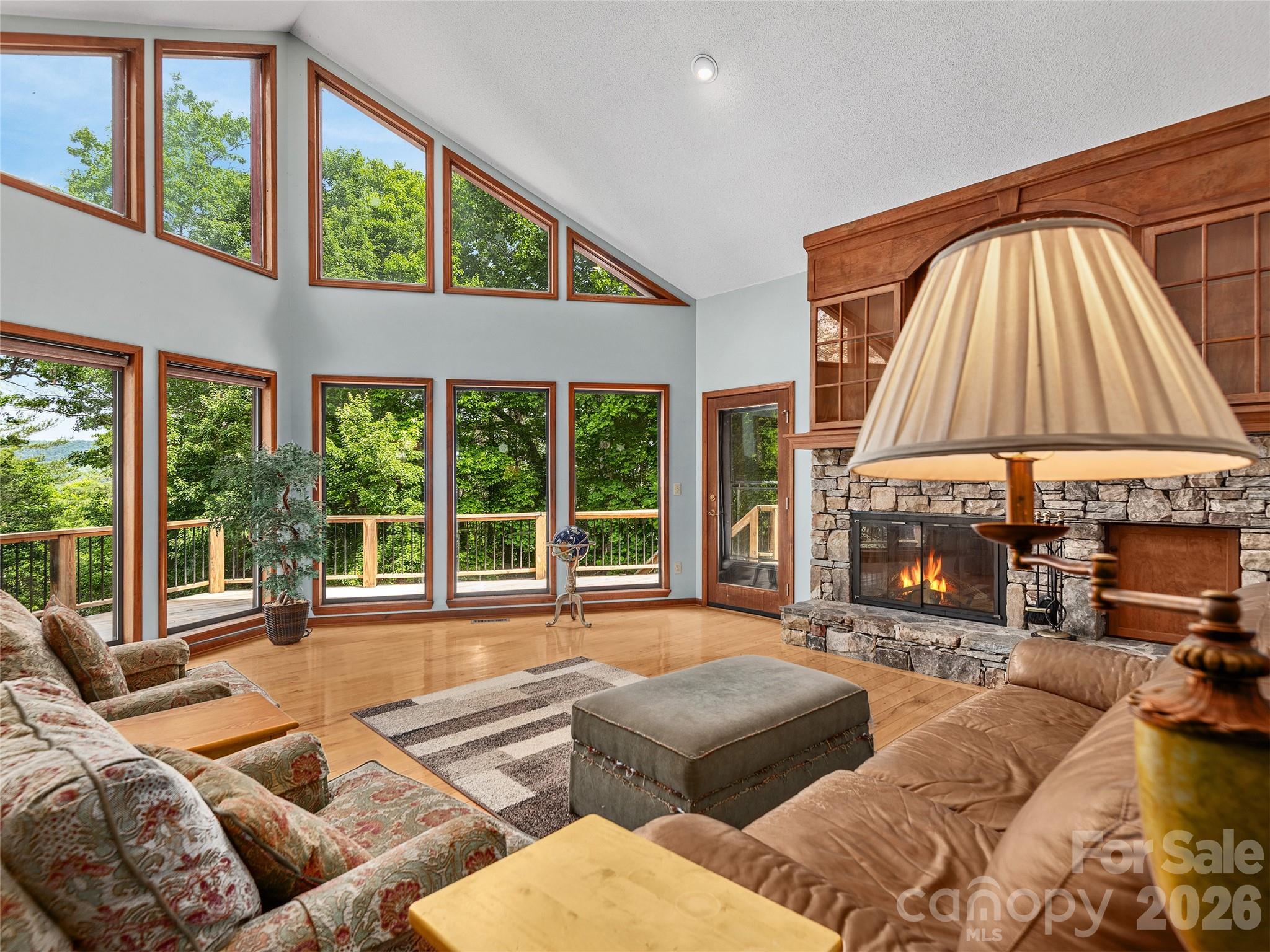 40 Deer Ridge Road Mills River, NC 28759 - Photo 3 of 35 a living room with furniture and a large window