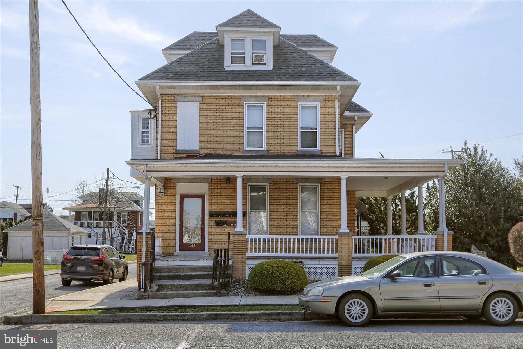 50 East Maple Street, Unit 4 Palmyra, PA 17078 - Photo 2 of 22 a car parked in front of a house