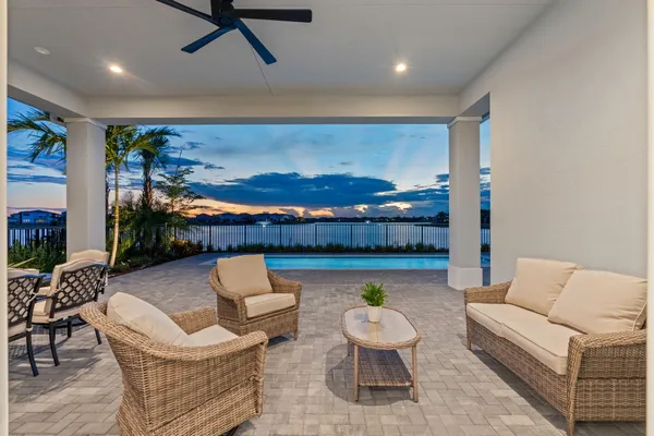 a outdoor living space with furniture and a fireplace
