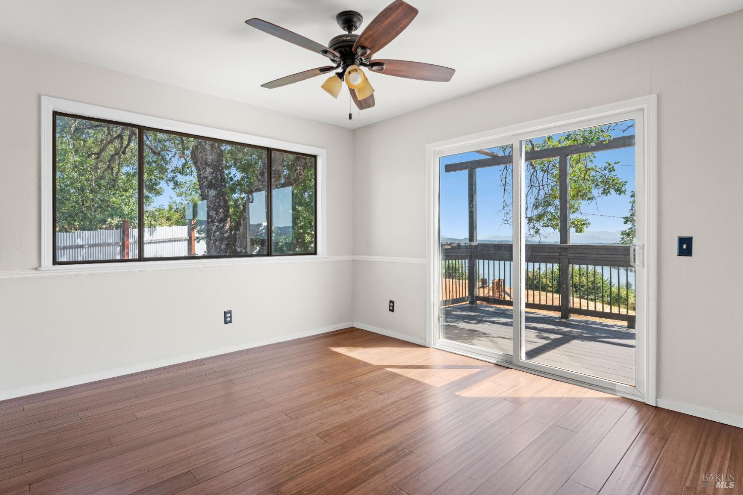 3850 Rd B Redwood Valley, CA 95470 - Photo 25 of 35 an empty room with wooden floor and windows