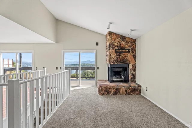 a view of a livingroom with a fireplace