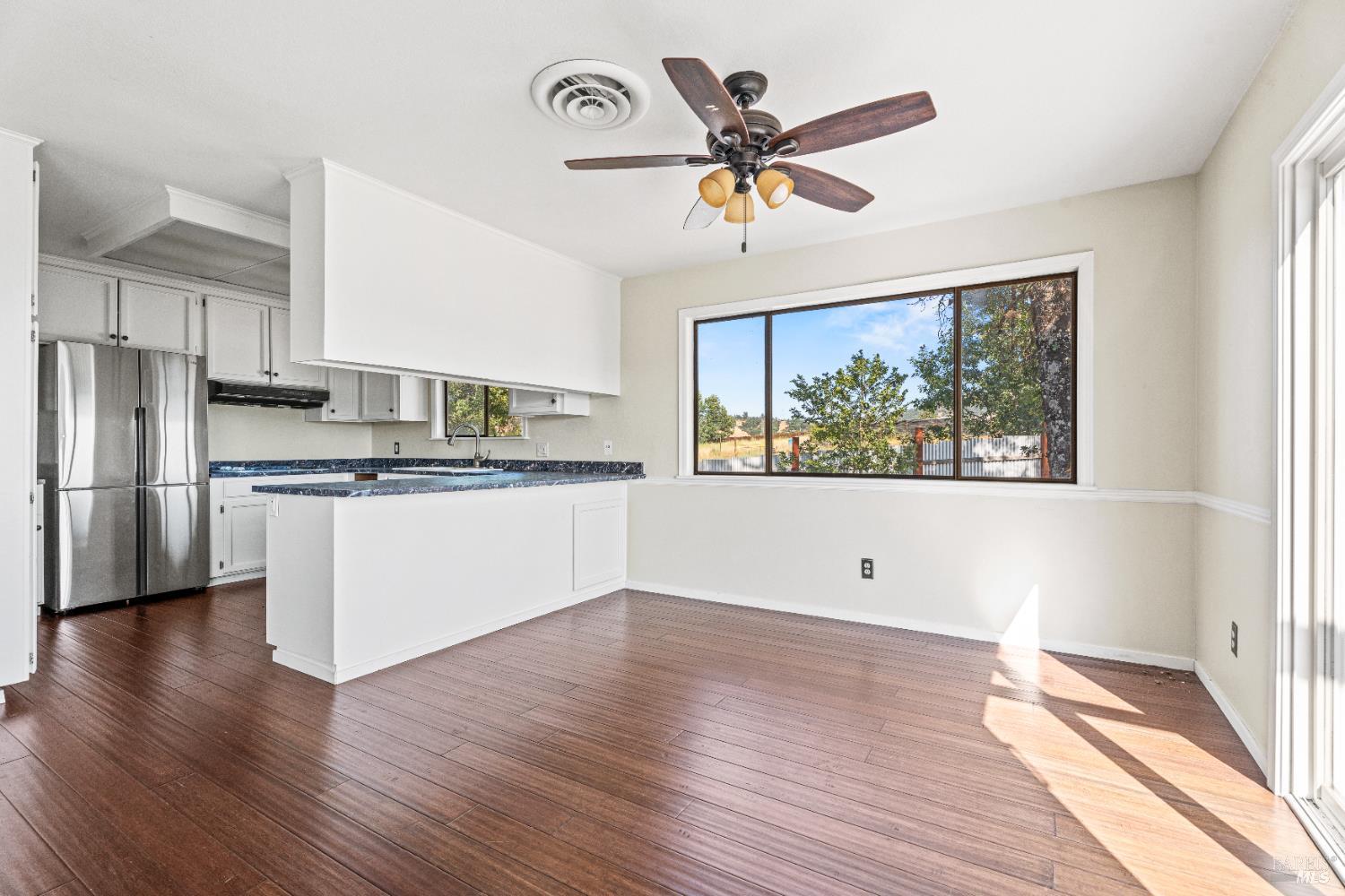 3850 Rd B Redwood Valley, CA 95470 - Photo 10 of 35 a view of kitchen with stainless steel appliances wooden floor and a window