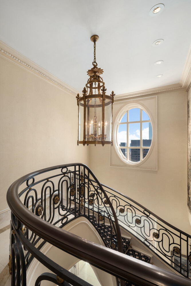 15 West 53rd Street, Unit PH Manhattan, NY 10019 - Photo 16 of 28 a view of a hallway with wooden floor