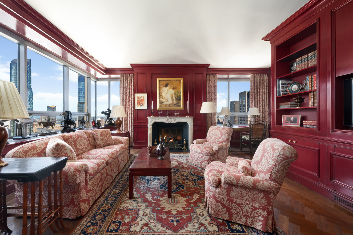 15 West 53rd Street, Unit PH Manhattan, NY 10019 - Photo 17 of 28 a living room with furniture fireplace and a large window