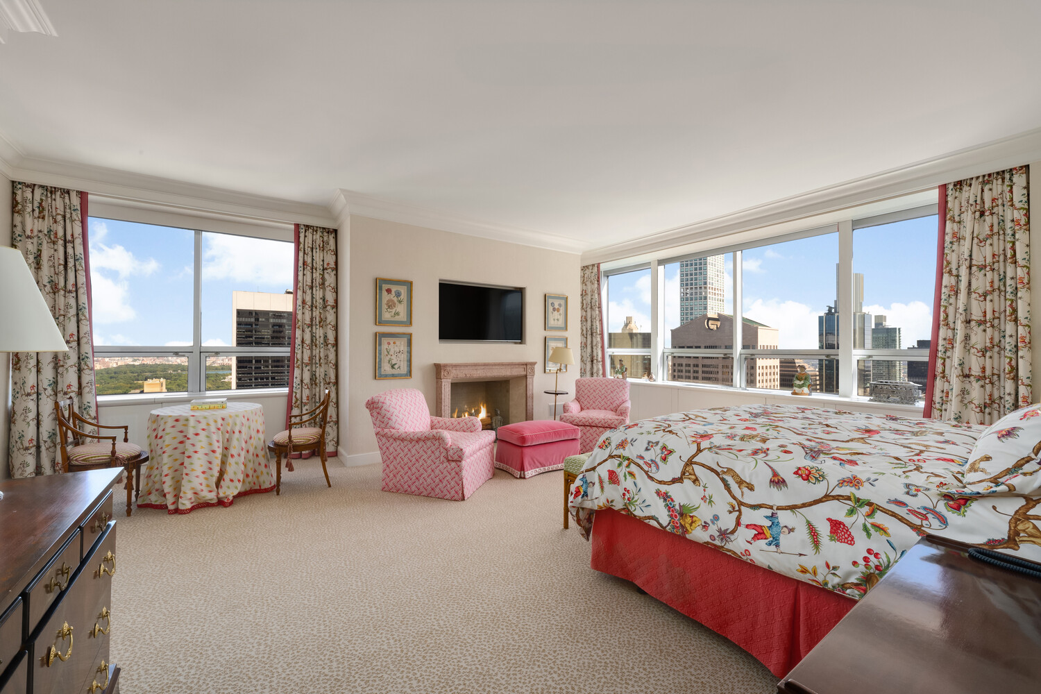 15 West 53rd Street, Unit PH Manhattan, NY 10019 - Photo 18 of 28 a bed room with a bed and large window