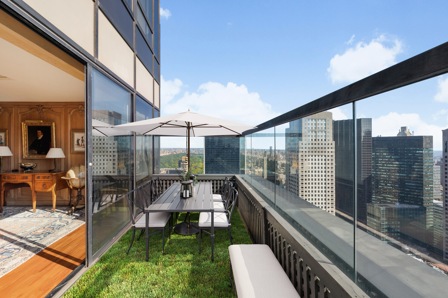 15 West 53rd Street, Unit PH Manhattan, NY 10019 - Photo 6 of 28 a balcony with chairs