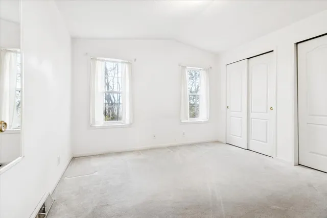 an empty room with windows