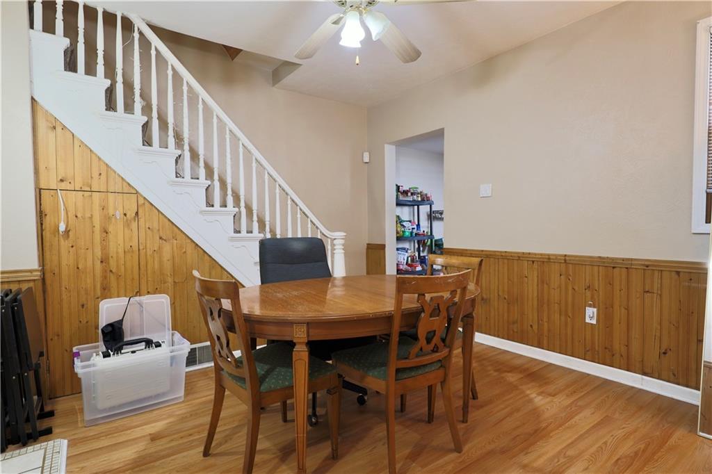 1923 Wharton Street Pittsburgh, PA 15203 - Photo 11 of 34 a view of a dining room with furniture and wooden floor
