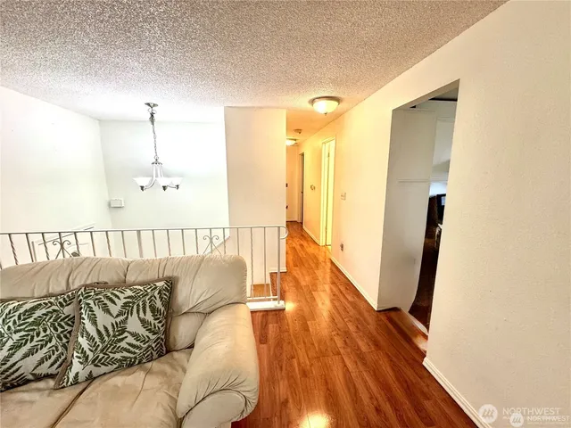 a balcony with wooden floor