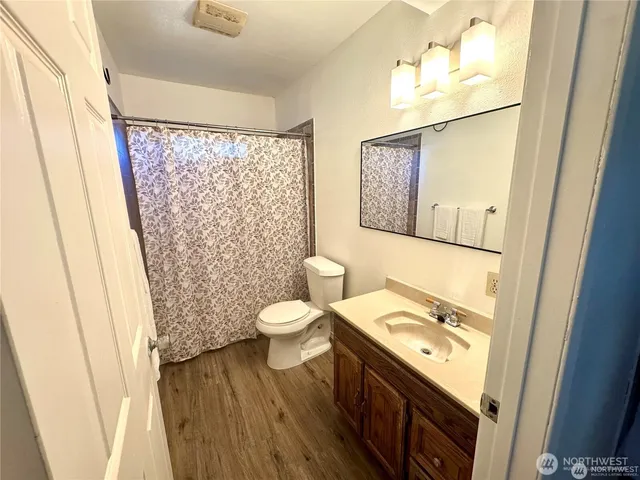 a bathroom with a sink and a toilet
