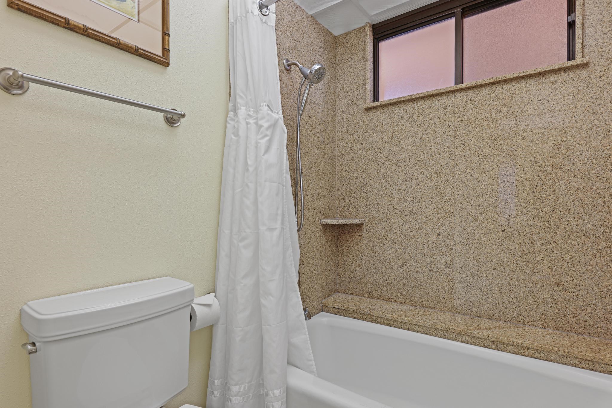 3445 Lower Honoapiilani Road, Unit 727 Lahaina, HI 96761 - Photo 24 of 42 a bathroom with a shower and a toilet