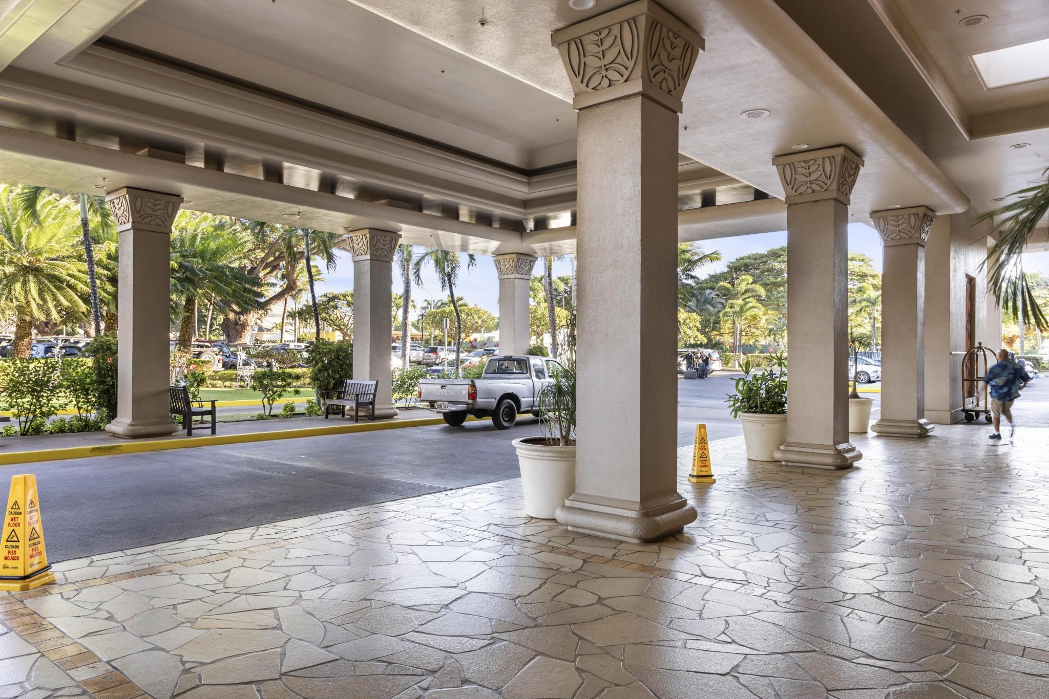 3445 Lower Honoapiilani Road, Unit 727 Lahaina, HI 96761 - Photo 35 of 42 a view of a building with floor to ceiling windows and wooden floor