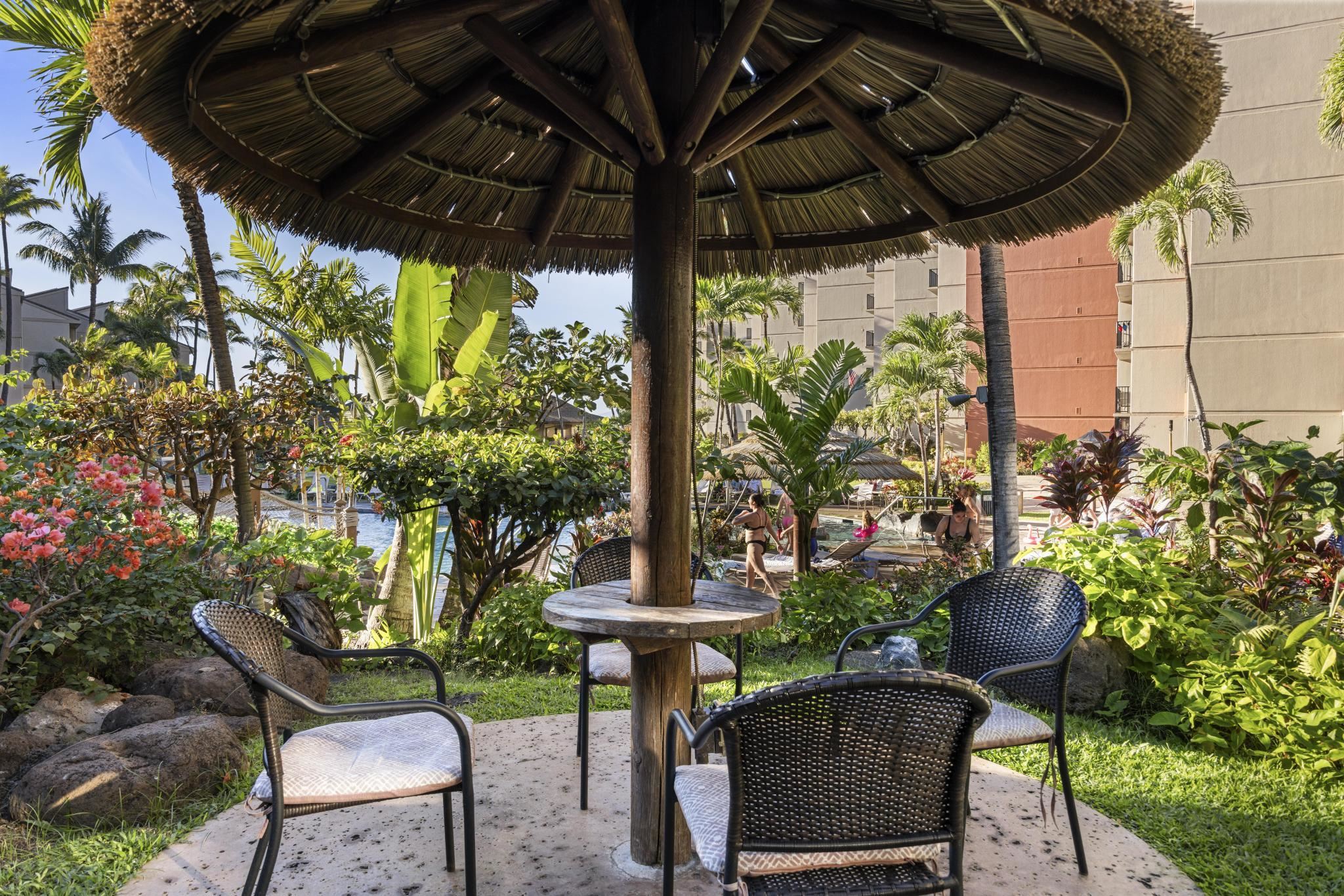 3445 Lower Honoapiilani Road, Unit 727 Lahaina, HI 96761 - Photo 36 of 42 a view of a chairs and table in the patio