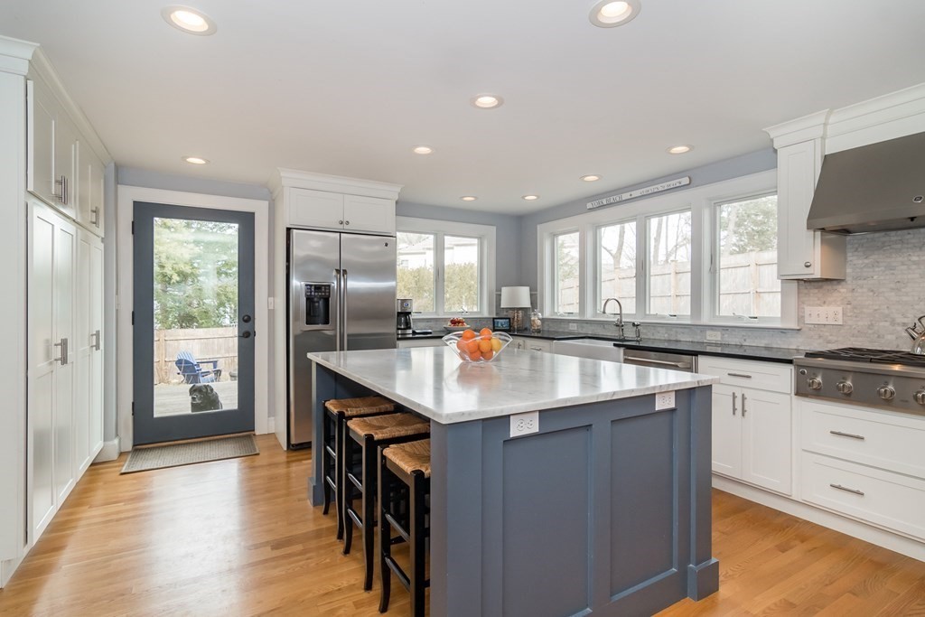 7 Summit Road Wellesley, MA 02482 - Photo 8 of 19 a kitchen with counter top space sink and stainless steel appliances