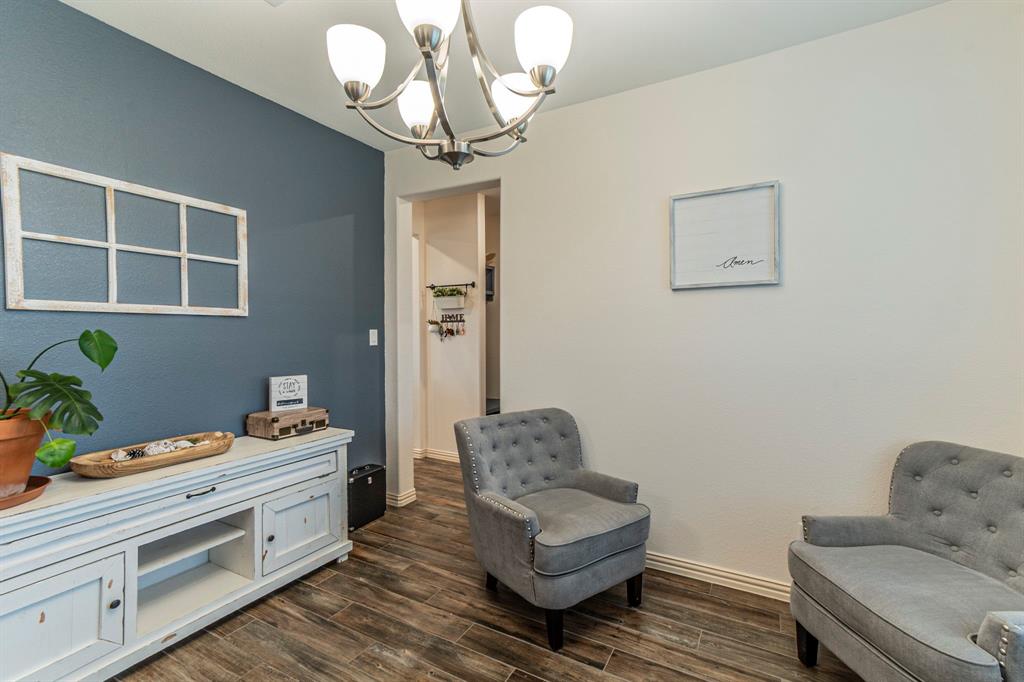 8432 Abner Road Terrell, TX 75161 - Photo 18 of 33 a bathroom with a sink and a mirror